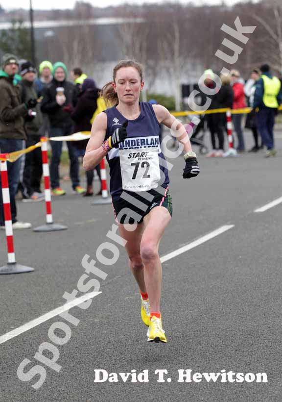 Fastest leg of the day Alyson Dixon (Sunderland Strollers) leads the senior womens Elswick Road Relays after the first leg.